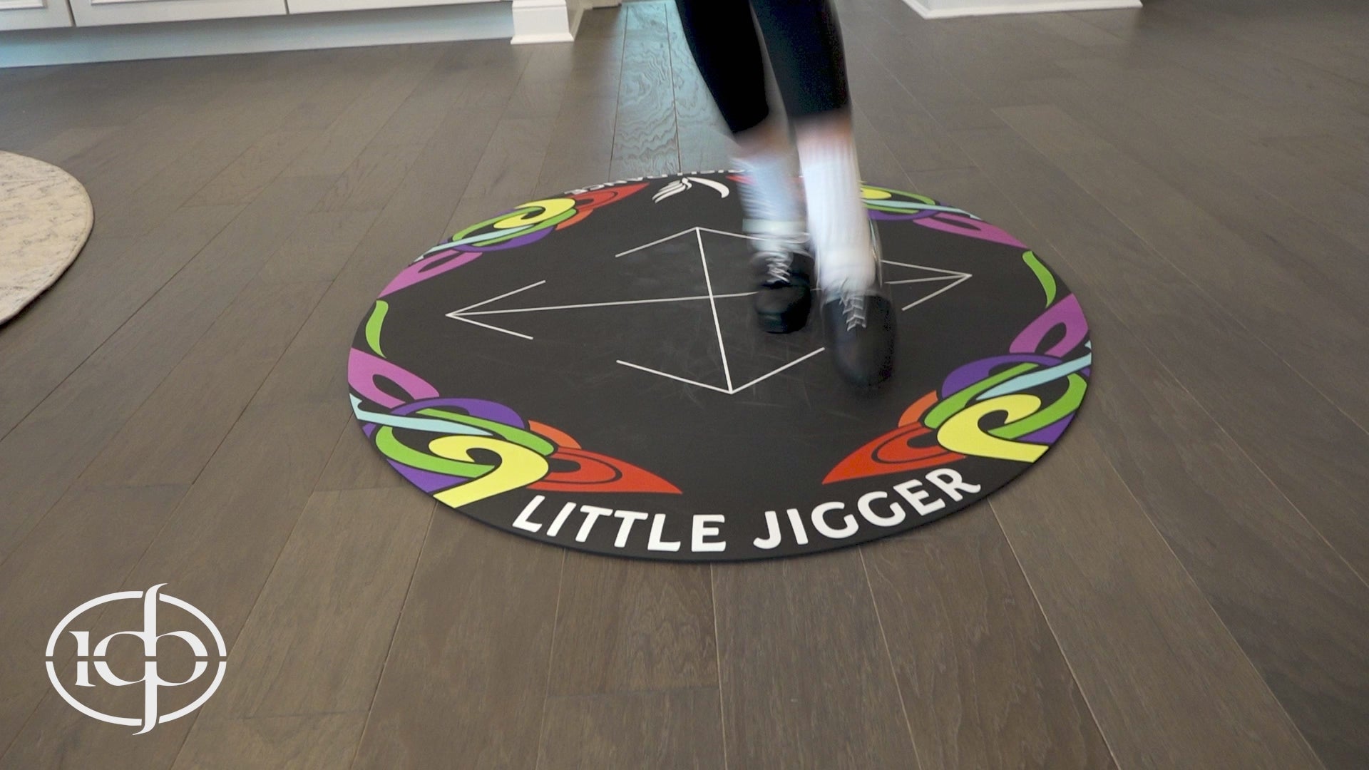 Load video: irish dancer explaining how to use the irish dance pro little jigger irish dance mat.